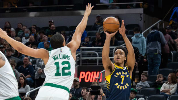 Malcolm Brogdon takes a shot during Pacers vs. Celtics.